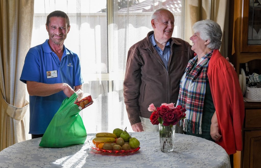 John Douglass with Heather and Gordon Tucker, aged care employee day