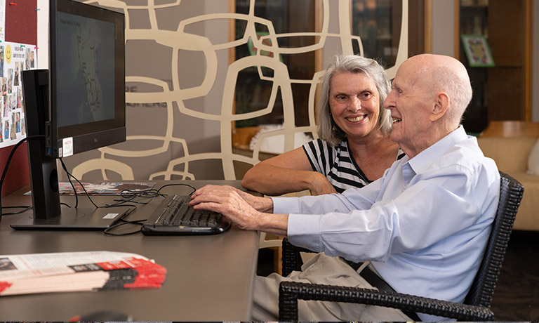 Elderly man on computer