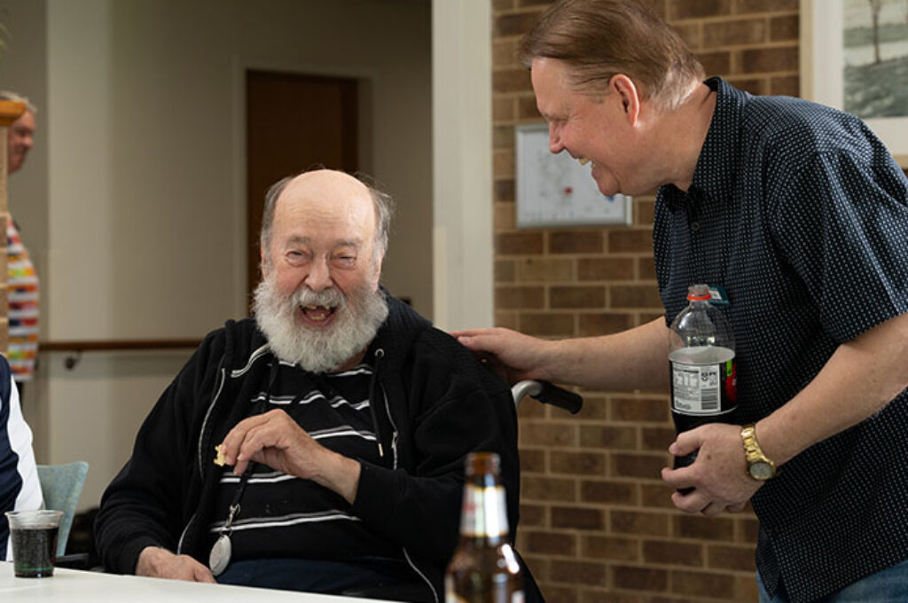 Two elderly men chatting