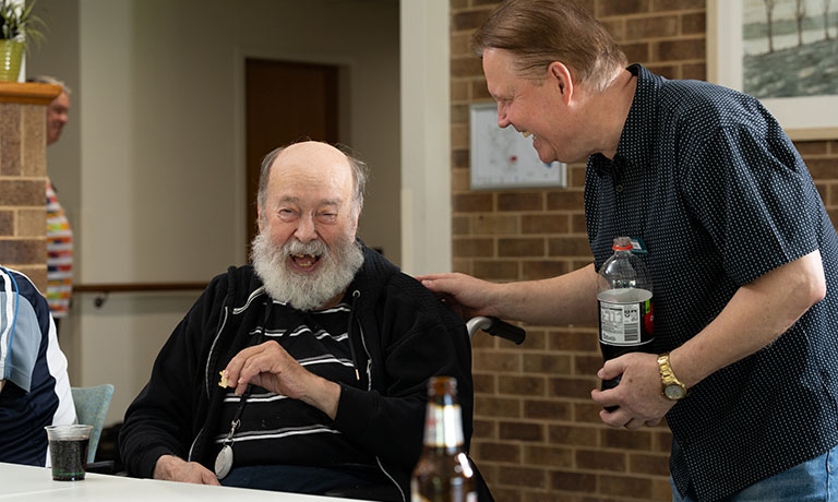 Two elderly men chatting