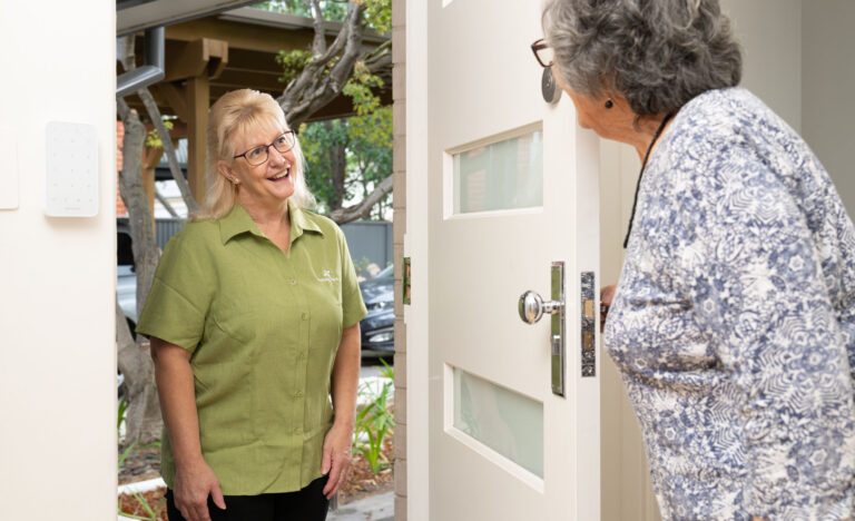 Helping Hand worker arriving at clients home